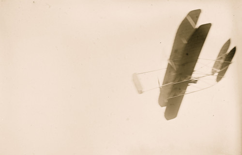 Orville Wright flying in his airplane Poster Print - Item # VARBLL058749509L