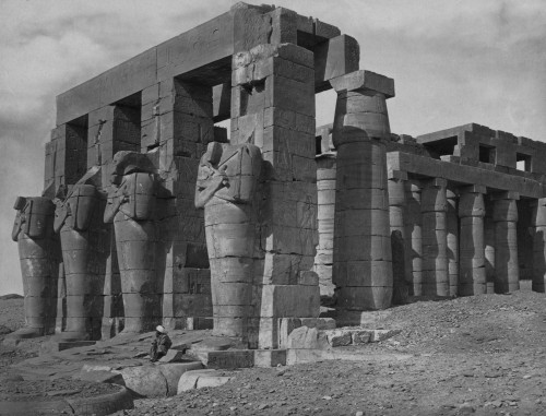 The Memnonium.  Four headless statues standing before colonnade.  Luxor is a city in Upper Egypt and the capital of Luxor Governorate and the site of the Ancient Egyptian city of Thebes Poster Print by Francis Firth - Item # VARBLL0587419474