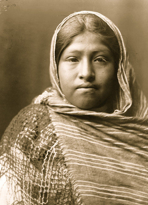 Yaqui girl, head-and-shoulders portrait, facing front, with striped shawl draped around shoulders and over head Poster Print