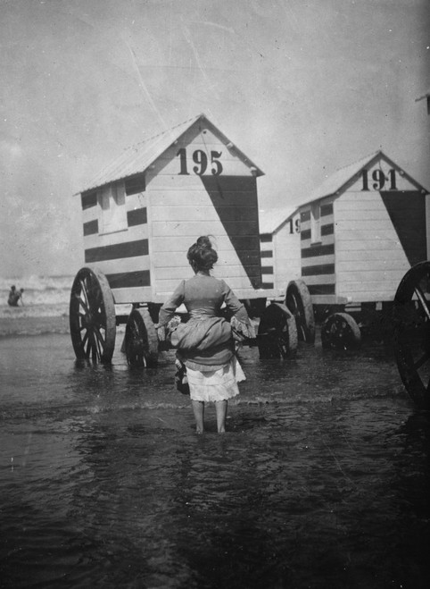 Bathing Booths at Ostend, Belgium; womanbather lifts up her dress Poster Print - Item # VARBLL058750054L