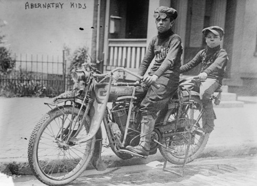 Two Children on a Motorcycle Poster Print - Item # VARBLL058748805L