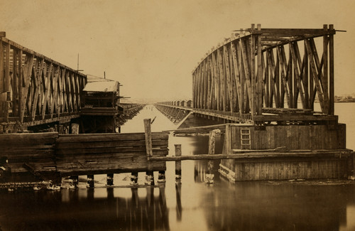 New bridge over Potomac River on the Washington, Alexandria and Georgetown Railroad. Total length 5,104 feet; trestle railroad bridge across the Potomac River. Poster Print - Item # VARBLL058753433L