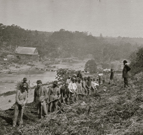 Jericho Mills, Va. Party of the 50th New York Engineers building a road on the south bank of the North Anna, with a general headquarters wagon train crossing the pontoon bridge Poster Print - Item # VARBLL058753395L