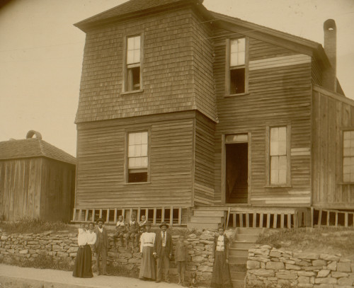 African Americans standing on sidewalk in front of house in Georgia Poster Print - Item # VARBLL0587632518
