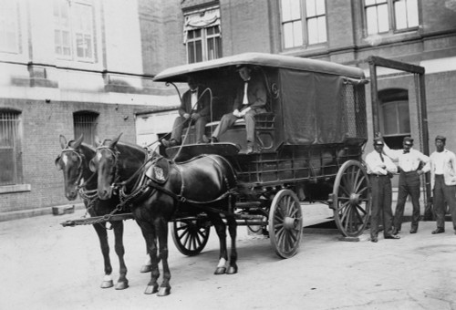 Horse-drawn wagon outside Bureau of Engraving and Printing building; 2 White wagon drivers and 3 African American Loaders Poster Print - Item # VARBLL058746676L