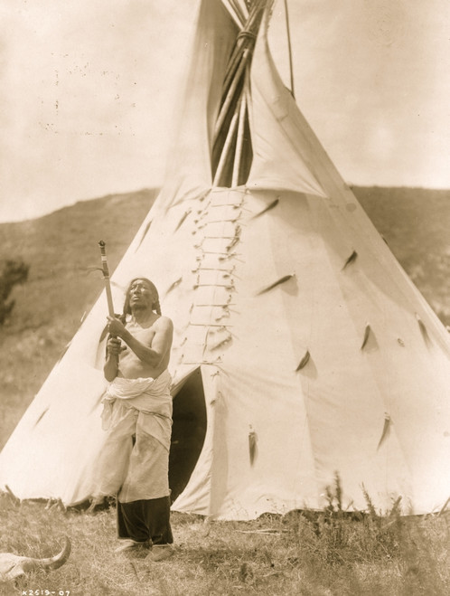 Dakota man standing outside tipi gazing upward. Poster Print - Item # VARBLL058746898L