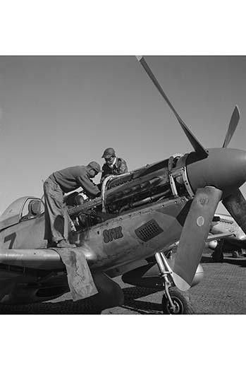 Mechanics of the Tuskegee Airmen prepare a fighter for combat Poster Print by unknown - Item # VARBLL0587245433