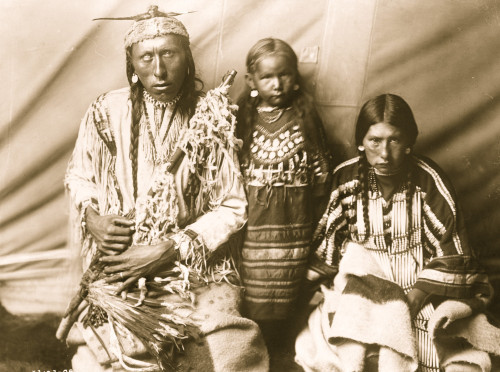 Three-quarter length portrait of Piegan family. Poster Print - Item # VARBLL058747615L
