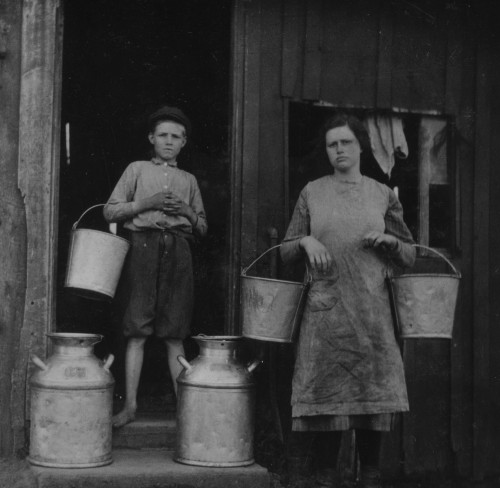 Holding pails and cans of milk Poster Print - Item # VARBLL058755201L