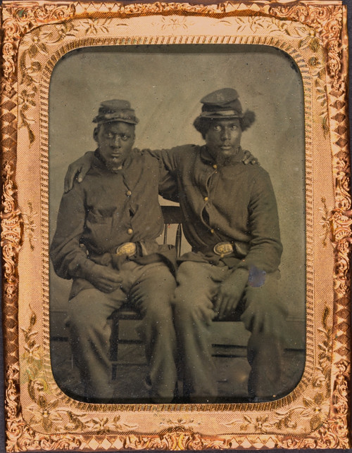 Two unidentified African American soldiers, full-length portrait, wearing uniforms, seated with arms around each other's shoulders, facing front Poster Print - Item # VARBLL0587631333