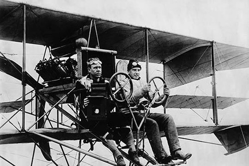 Two aviator pilot an Early Biplane; One with a camera Poster Print by unknown - Item # VARBLL058745842L