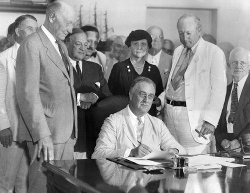President Franklin Roosevelt Signs The Social Security Bill. L-R Rep. Robert Boughton Of Nc Sen. Robert Wagner History - Item # VAREVCCSUA000CS340