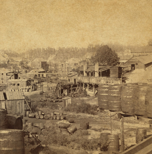 Barrels And Buildings At An Oil Refinery In Erie History - Item # VAREVCHISL020EC285