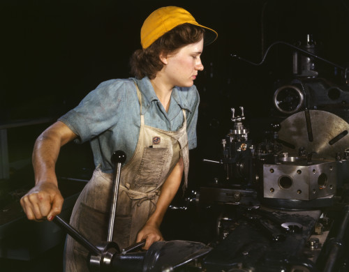 Muscular Woman Lathe Operator Machining Aircraft Parts During World War 2. Consolidated Aircraft Corporation Plant History - Item # VAREVCHISL036EC830 Muscular Woman Lathe Operator Machining Aircraft Parts During World War 2. Consolidated Aircraft Corporation Plant History - Item # VAREVCHISL036EC830