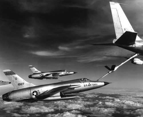 Fighters Refuel Over Vietnam. Us Air Force F-105 Thunderchiefs Refuel Before Their Bombing Mission In Vietnam. Jan. 1966. History - Item # VAREVCHISL033EC520