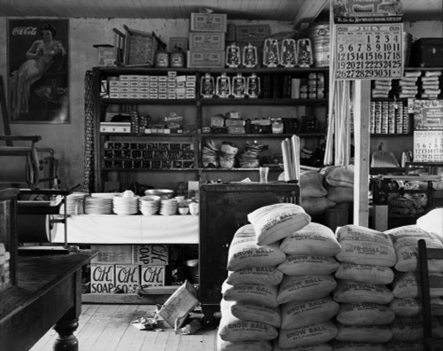 General Store Interior In Moundville Alabama. Goods For Sale Include Flour Salt Cooking Utensils Canning Jars Soap Kerosene Lanterns Rope And Shotgun Shells. 1936 Photo By Walker Evans. History - Item # VAREVCHISL023EC279
