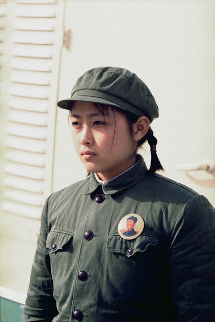 Nixon In China. Young Chinese Girl Dressed In Soldier Attire And A Portrait Pin Of Mao At The Arrival Ceremonies At Beijing For The Press Plane During Nixon'S Trip To China. Feb. 21 1972. History - Item # VAREVCHISL032EC119 Nixon In China. Young Chinese Girl Dressed In Soldier Attire And A Portrait Pin Of Mao At The Arrival Ceremonies At Beijing For The Press Plane During Nixon'S Trip To China. Feb. 21 1972. History - Item # VAREVCHISL032EC119