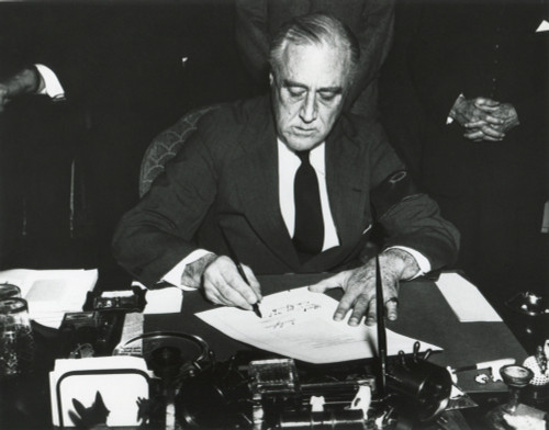 President Franklin Roosevelt Signing The Declaration Of War Against Japan. He Wears A Black Armband In Mourning For His Recently Deceased Mother. Dec. 8 History - Item # VAREVCHISL036EC300