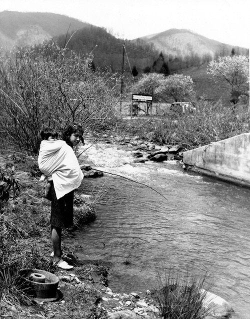 Cherokee Indian-Cherokee Indian Woman Using A Willow Switch And A Bent Pin To Fish. North Carolina Cherokee Reservation History - Item # VAREVCHBDCHINCL001