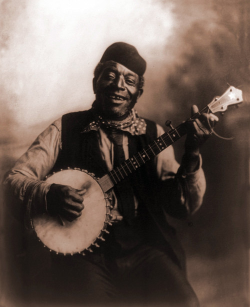 African American Man Seated And Holding Banjo. Ca. 1911. History - Item # VAREVCHISL007EC054