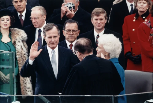 President George Herbert Walker Bush Takes The Oath Of Office Administered By Chief Justice William Rehnquist. Vice President Dan Quayle And Barbara Bush Look On. January 20 History - Item # VAREVCHISL010EC190