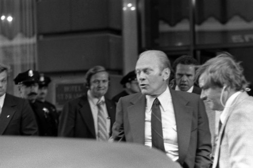 President Ford Winces At The Sound Of The Gun During The Assassination Attempt By Sara Jane Moore. Shot From 40 Feet Away The Bullet Missed Ford By 12 Inches. Sept. 22 1975. History - Item # VAREVCHISL029EC262