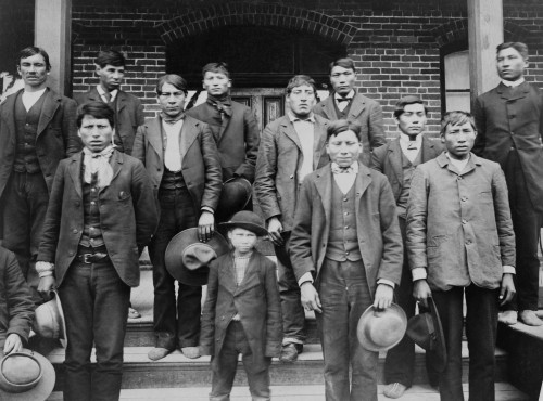 Native American Young Men And A Boy Posed On The Steps Of Carlisle Indian School History - Item # VAREVCHISL046EC399
