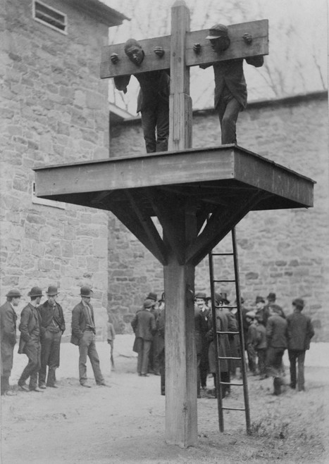 Two African American Men Confined In A Delaware Pillory Above A Whipping Post. Spectators To The Punishment Loiter In The Background. 1889. History - Item # VAREVCHISL014EC065