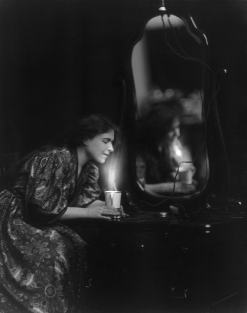 General Electric Advertising Photo Of Woman At Dresser Heating A Cup Of Water With A General Electric Appliance. Ca. 1908 History - Item # VAREVCHISL020EC108