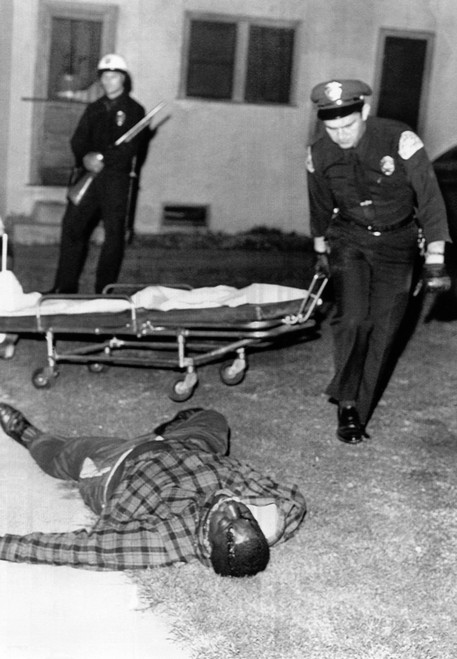March 1966 Watts Riot. A Sniper Killed Two In Watts Section Of Los Angeles. Ambulance Attendants Pick Up The Body Of African American History - Item # VAREVCCSUA001CS686