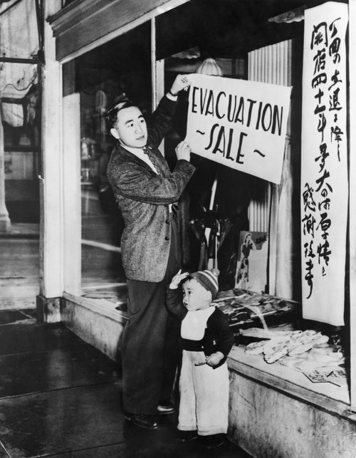 Japanese-American Merchant Posts A Sale Sign On His San Francisco Store In Preparation For Internment. Internees Were Given Little Notice And Forced To Abandon Or Sell Their Businesses At Heavy Losses. History - Item # VAREVCHISL019EC174