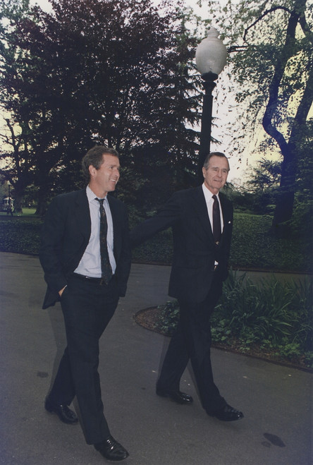 President George H.W. Bush Walks On White House Grounds With His Son George W. Bush Then Head Of An Investment Group That Owned The Texas Rangers Baseball Team. April 29 1992. History - Item # VAREVCHISL023EC224