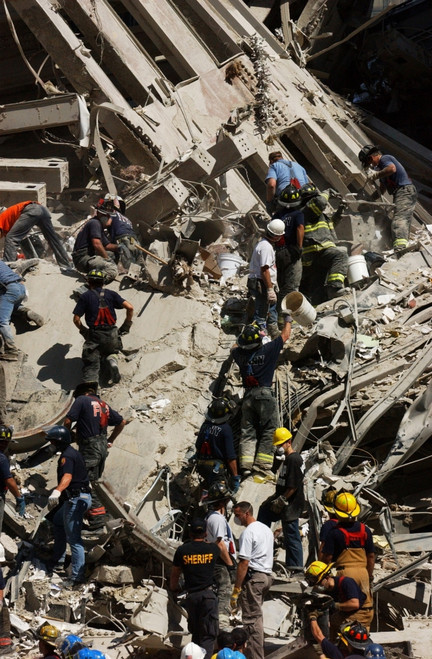 A 'Bucket Brigade' Works To Carefully Clear Debris Of The World Trade Center History - Item # VAREVCHISL040EC082