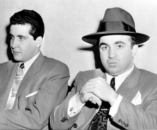 Mickey Cohen-(R)Seated Next To Johnny Stompanato During A 1950 Trial At Which Both Testified. Hollywood History - Item # VAREVCHBDMICHCL001
