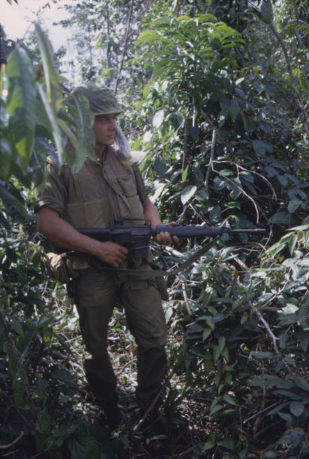 Vietnam War. Us Marine Moves Through Heavy Grass In A Deserted Rice Paddy While On Patrol During A Search And Destroy Operation In Quang Tri Province. Nov.-Dec. 1967. History - Item # VAREVCHISL033EC551