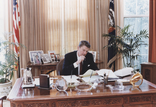 President Reagan Working At His Oval Office Desk Shortly Before Delivering His 1982 State Of The Union Address To Congress. Jan 26 1982. Po-Usp-ReaganNa-12-0094M History - Item # VAREVCHISL023EC097
