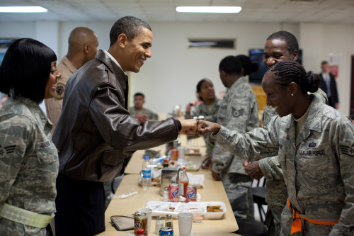 President Obama Greets A Female Soldier With A Fist Bump At Bagram Airfield In Afghanistan. March 28 2010 History - Item # VAREVCHISL027EC006