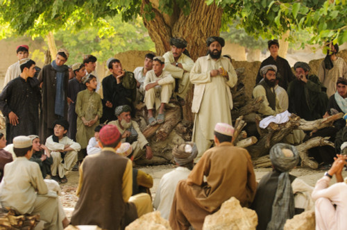 District Chief Abdul Qayum Center Speaks To Afghan Elders During A Shura In Zabul Province Afghanistan. Qayum Discussed Security In The District And The Upcoming Parliamentary Elections. Sept. 8 2010. History - Item # VAREVCHISL024EC138