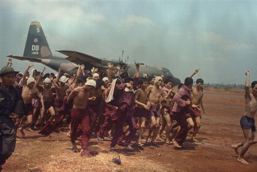 Arvn Prisoner Of War Repatriation. South Vietnamese Freed Pows Shed Their Prison Uniforms And Shout Political Slogans After Their Repatriation. March 13 History - Item # VAREVCHISL033EC358