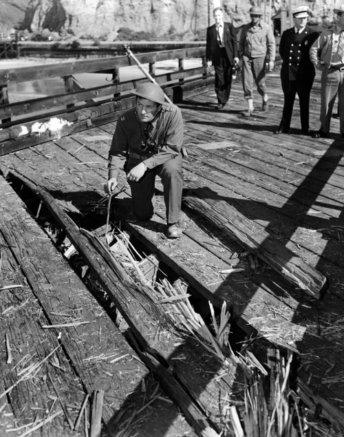 The Santa Barbara Oil Field Was Shelled By A Japanese Submarine. A Soldier Examines A Path Grooved In An Ocean Pier Aimed At The Oil Field. There Was Little Damage And No Casualties. Feb. 22 History - Item # VAREVCCSUA001CS714