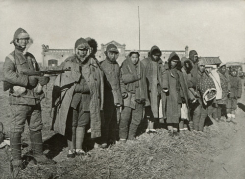 Chinese Civil War 1946-1949. Troops Of The 38E Division Of Nationalists Chinese Army In Manchuria Guard Communist Prisoners. Jan. 9 History - Item # VAREVCHISL038EC721