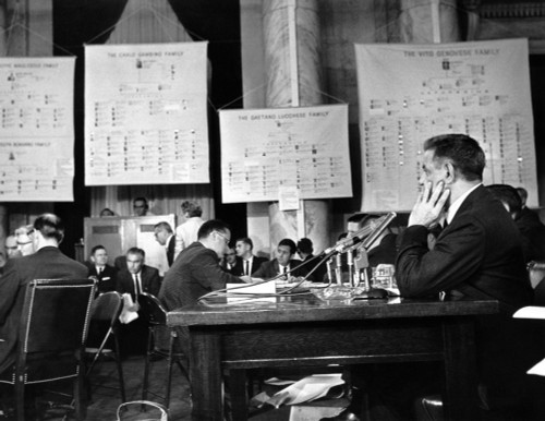 Joseph Valachi Continued His Senate Investigations Subcommittee Testimony. On The Wall Of The Senate Caucus Room Are 'Organization Charts' Of The 'Cosa Nostra' Crime Families In New York City. Csu - Item # VAREVCCSUA001CS039 Joseph Valachi Continued His Senate Investigations Subcommittee Testimony. On The Wall Of The Senate Caucus Room Are 'Organization Charts' Of The 'Cosa Nostra' Crime Families In New York City. Csu - Item # VAREVCCSUA001CS039