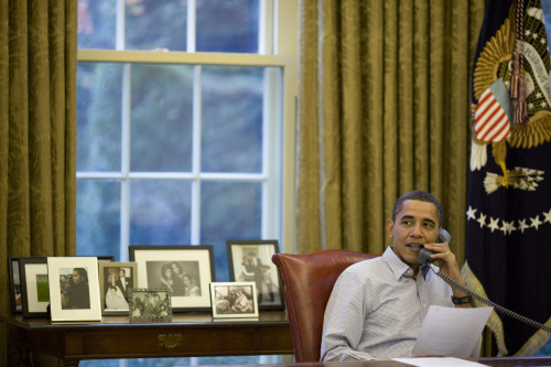 President Barack Obama Talks With American Service Men And Women During Phone Calls From The Oval Office On Thanksgiving Day Nov. 26 2009. History - Item # VAREVCHISL025EC164