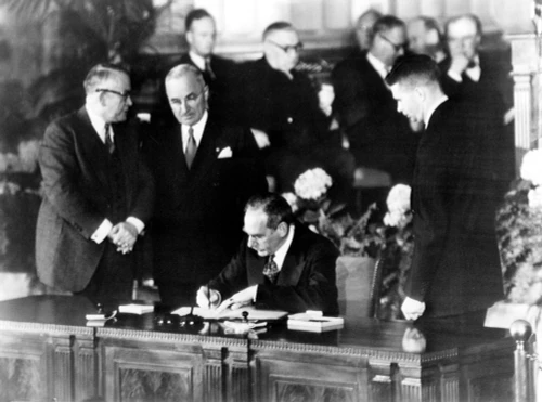 Nato--Secretary Of State Dean Acheson Signs The North Atlantic Treaty For The U.S. From L To R Vice President Alben W. Barkley History - Item # VAREVCHBDNATOCL001