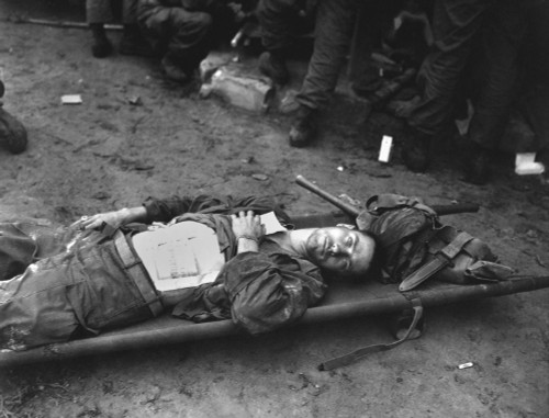 U.S. 21St Infantry Soldier Lies On A Stretcher At A Medical Aid Station. He Was Wounded While Crossing The Naktong River During The 8Th Armies Advance North From The Pusan Perimeter. Sept. 19 History - Item # VAREVCHISL038EC164
