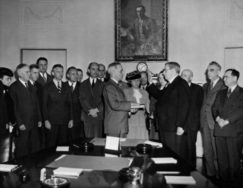 President Harry S. Truman Takes Oath Of Office From Chief Justice Harlan F. Stone In The Cabinet Room Of The White House History - Item # VAREVCHISL010EC194