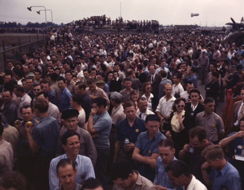 War Workers During A Shift Change. They Build At Liberator Bombers At The Consolidated Aircraft Corporation History - Item # VAREVCHISL033EC231 War Workers During A Shift Change. They Build At Liberator Bombers At The Consolidated Aircraft Corporation History - Item # VAREVCHISL033EC231