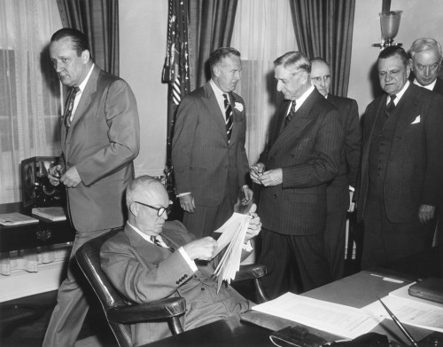 President Eisenhower Reads The Highway Act Of 1954 Before Signing. May 6 History - Item # VAREVCHISL039EC049