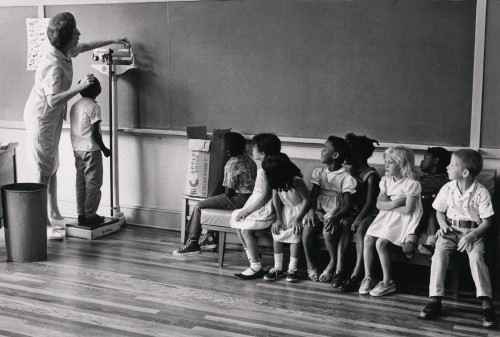 Children Of Migrant Workers Being Measured For Height History - Item # VAREVCHISL019EC096