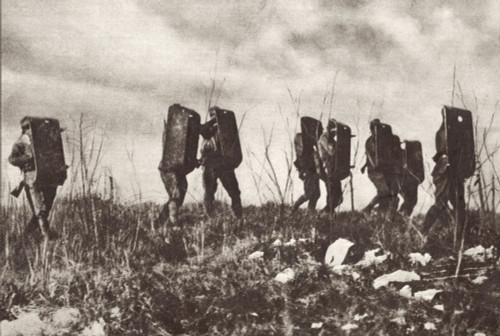 World War 1 In The Italian And Austria Alps. Italian Soldiers Wearing Old Fashioned Head And Body Armor As They Move Against Austrian Machine Gun Fire. Ca. 1915-18. History - Item # VAREVCHISL044EC025